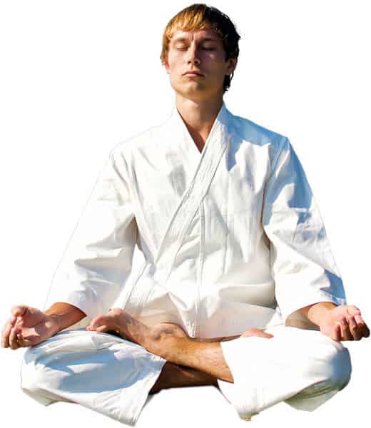 Martial Arts Lessons for Adults in Randolph __STATE__ - Young Man Thinking and Meditating in White